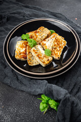 fried cheese halloumi basil meal food snack on the table copy space food background rustic top view