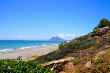 view along the beach near La Alcaidesa with a view towards the Rock of Gibraltar and La Línea de...