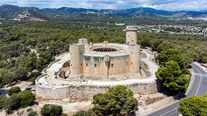 Fototapeta na wymiar Aerial view of the Castell de Bellver (Bellver Castle), a gothic-style castle built in the 14th century on a hill overlooking Palma on the Balearic island of Majorca (Spain) in the Mediterranean Sea
