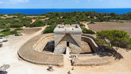 Castle of the Punta de N'Amer, a medieval defensive tower in a protected natural area located on a...