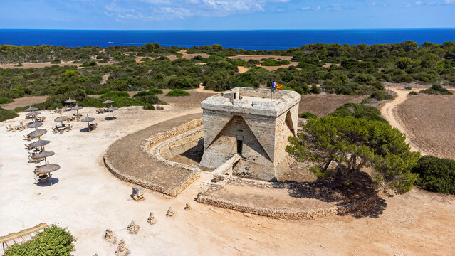 Castle of the Punta de N'Amer, a medieval defensive tower in a protected natural area located on a peninsula between Sa Coma and Cala Millor on the coast of Majorca in the Balearic Islands, Spain
