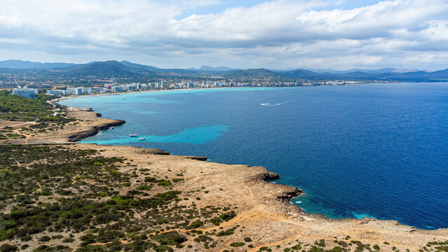 Aerial view of Cala Millor from the Punta de N'Amer, a protected natural area on the eastern coast of Majorca in the Balearic Islands, Spain