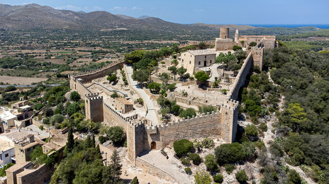 Castle of Capdepera on the Balearic island of Majorca in the Mediterranean Sea - Medieval walled fortress built on a slope covered with maquis
