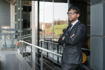 african businessman in suit at street