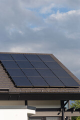 Fototapeta premium new building with solar panel on rooftop
