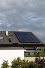 new building with solar panel and chimney on rooftop