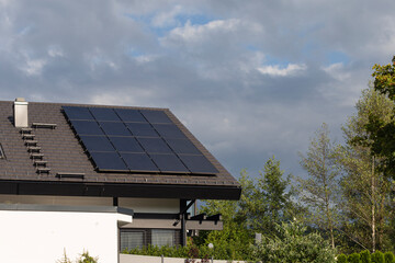 new building with solar panel and chimney on rooftop