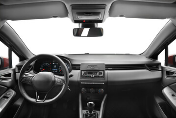 A photo captured from the middle of the back seat of a modern passenger car, showcasing the interior features such as steering wheel, gear shift, front windshield and dashboard - 631602544