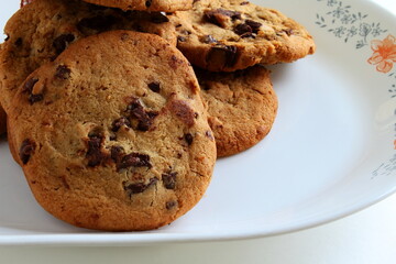 tasty organic homemade dark chocolate chip oatmeal cookies,sweet snack biscuit in dish
