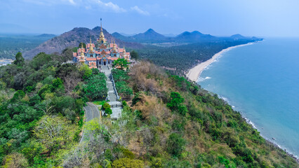 Fototapeta na wymiar high angle shot Aerial view of Wat Tang Sai Buddhist Temple Temple located on the top of the mountain in Thailand