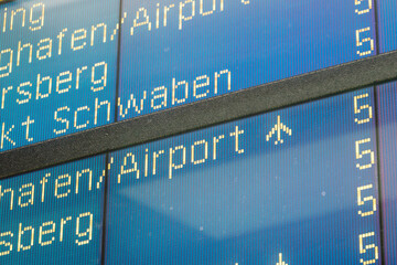 Detail view on airplane flight arrival sign