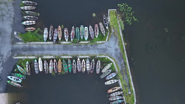 small fishing boats at lough sheelin harbour, county cavan, ireland