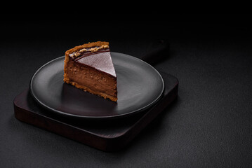 Delicious, fresh, sweet chocolate cake with nuts cut into slices