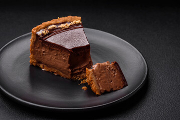 Delicious, fresh, sweet chocolate cake with nuts cut into slices