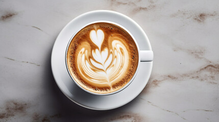 top down view of a cup of cappuccino on a marble table