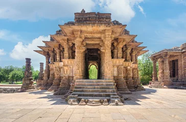 Fotobehang Oud gebouw The Sun Temple at Modhera is an ancient Hindu temple located in the western state of Gujarat, India. Built in the 11th century during the reign of the Solanki dynasty, the temple was dedicated to Sun