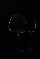 Empty wine glass isolated on black