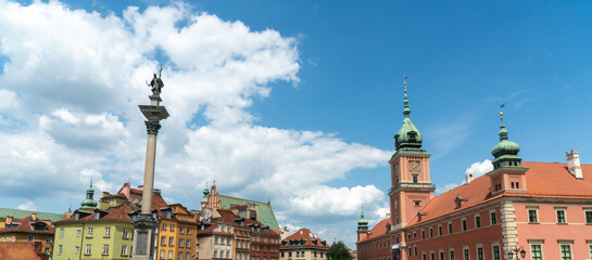 Wide shot of the Royal Palace and the Sigismund's Column Monument in Warsaw, Poland