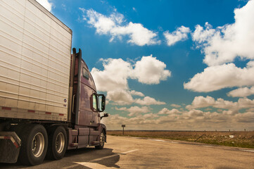 Restful Skies: Semi Truck at Peaceful Rest Area