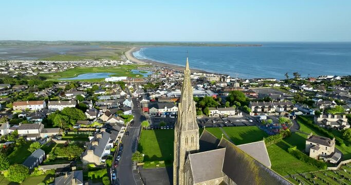 Flying over Catholic Church which overlooks the entire coastal town of Tramore