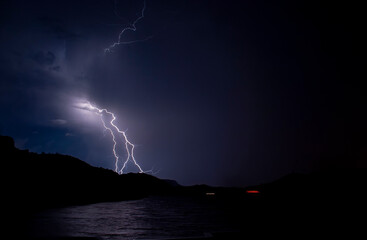 Lightning bolts striking at Lake Mead Nevada