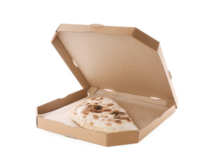 Cardboard box with delicious calzone on white background