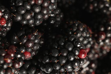 Wet tasty ripe blackberries as background ,closeup