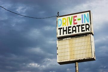 Aged and worn run-down drive-in theater sign