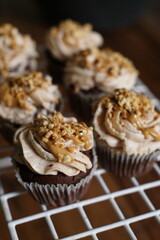 Homemade chocolate cupcake with peanut butter cream on top
