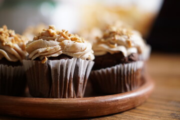 Homemade chocolate cupcake with peanut butter cream on top
