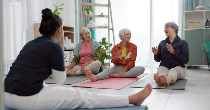 Senior yoga, high five and women in a class with success, applause and fitness with a coach. Happy, teamwork and elderly people with support and motivation after a workout with an instructor