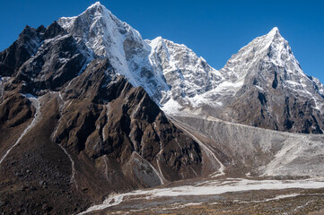 Beautiful view of Mt.Taboche (6495m) and Mt.Cholatse (6440m) on the way to Everest base camp trek in Nepal.