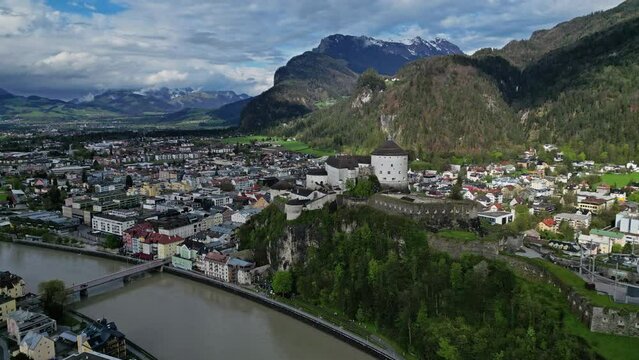 Aerial around view of Kufstein town with medieval Castle fortress in Tyrol, Austria, Alps mountains, 4k