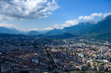 View on central part of Grenoble city from Bastille fortres witn mountains around, old cable car,...