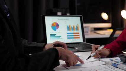 Business People Meeting to analyze and discuss and brainstorm the financial report chart data in the office Financial advisor teamwork and accounting concept.	 - Powered by Adobe