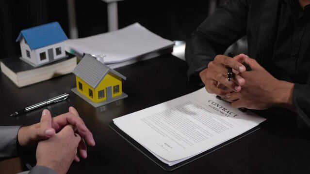 Rental agreement, Sale agent deal to agree successful home loan contract with a customer and sign agreement contract Insurance home concept.