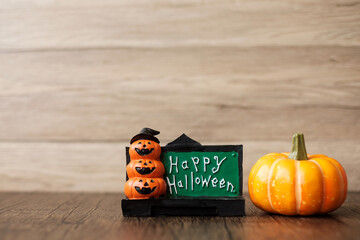 Orange pumpkin on table with copy space for banner background. Happy Halloween day, Hello October, fall autumn season, Festive, party and holiday concept