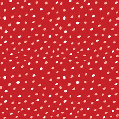 Seamless confetti pattern of two colored dots against red with a festive fun feel. Great for wrapping paper, clothing, kids' accessories, Christmas-themed decor, unisex fashion, accessories, wallpaper