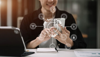 Zero trust security concept Person using computer and tablet with zero trust icon on virtual screen...