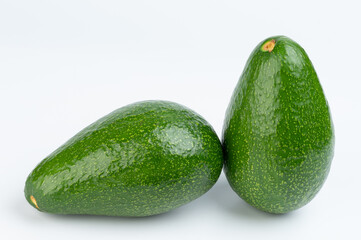 Pair  of green avocados