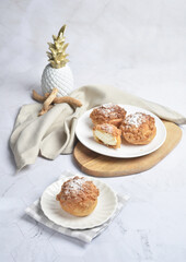 freshly handmade custard, chocolate, durian, matcha, cream puff w icing sugar cake pastry on marble luxury background with wood bamboo decoration halal food dessert menu for cafe