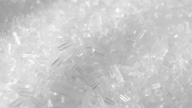 Monosodium glutamate (MSG) is a flavor enhancer commonly used in food. This macro video with a probe lens reveals its fine crystalline structure, highlighting its ability to enhance taste
