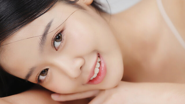Portrait of Young beauty Asian girl with Korean makeup style on isolated background. Facial treatment, Cosmetology.