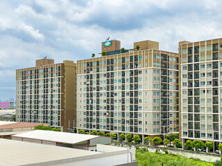 Condominium building on a sunny day with a blue sky