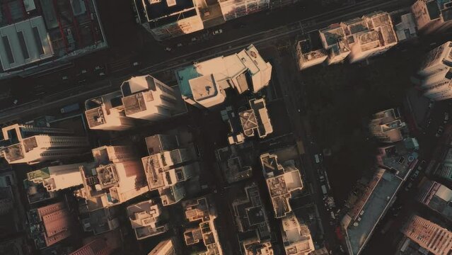 Aerial view city central park, trains, buildings and skyscrapers in New York during the day under blue skies. Best New York aerial shot. Wide shot on 4K RED camera.