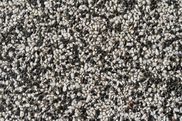 black and white gravel wall or empty dark stones cement table on top view and rough surface concrete floor ground for cobblestone interior or vintage exterior construction decor to texture background