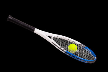 Tennis racquet with ball breaking the strings