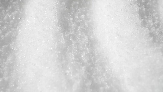 Iodized salt is a crucial dietary element, vital for thyroid function and preventing iodine deficiency. This macro video showcases its crystalline structure and the integration of iodine.

