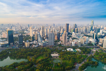 Naklejka premium Aerial view Office building with Lumpini Park downtown Financial district center in Sathorn