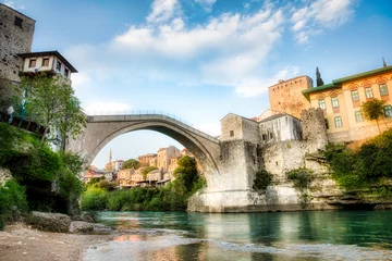 Papier Peint photo Stari Most The Famous Old Bridge (Stari Most) Crossing the River Neretva in Mostar, Bosnia and Herzegovina